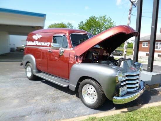 Red and gray vintage delivery van