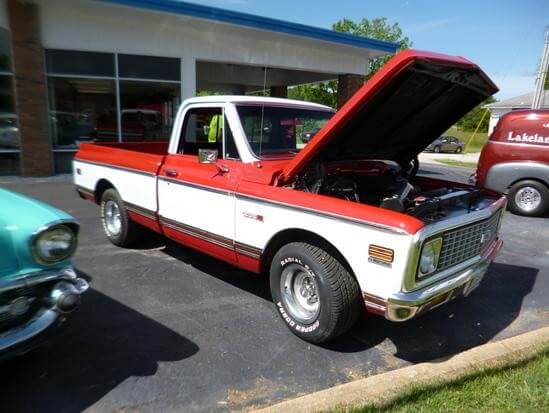 Red and white pickup truck
